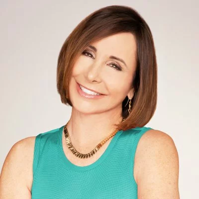 Smiling woman with short brown hair